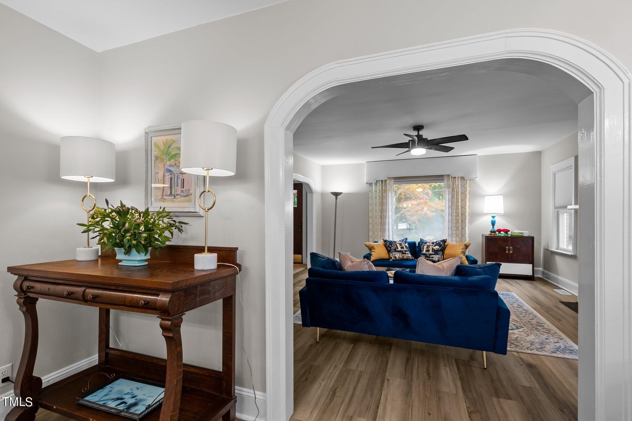 3215 Merriman Avenue Raleigh, NC 27607 - Photo 22 of 66 a living room with furniture and wooden floor