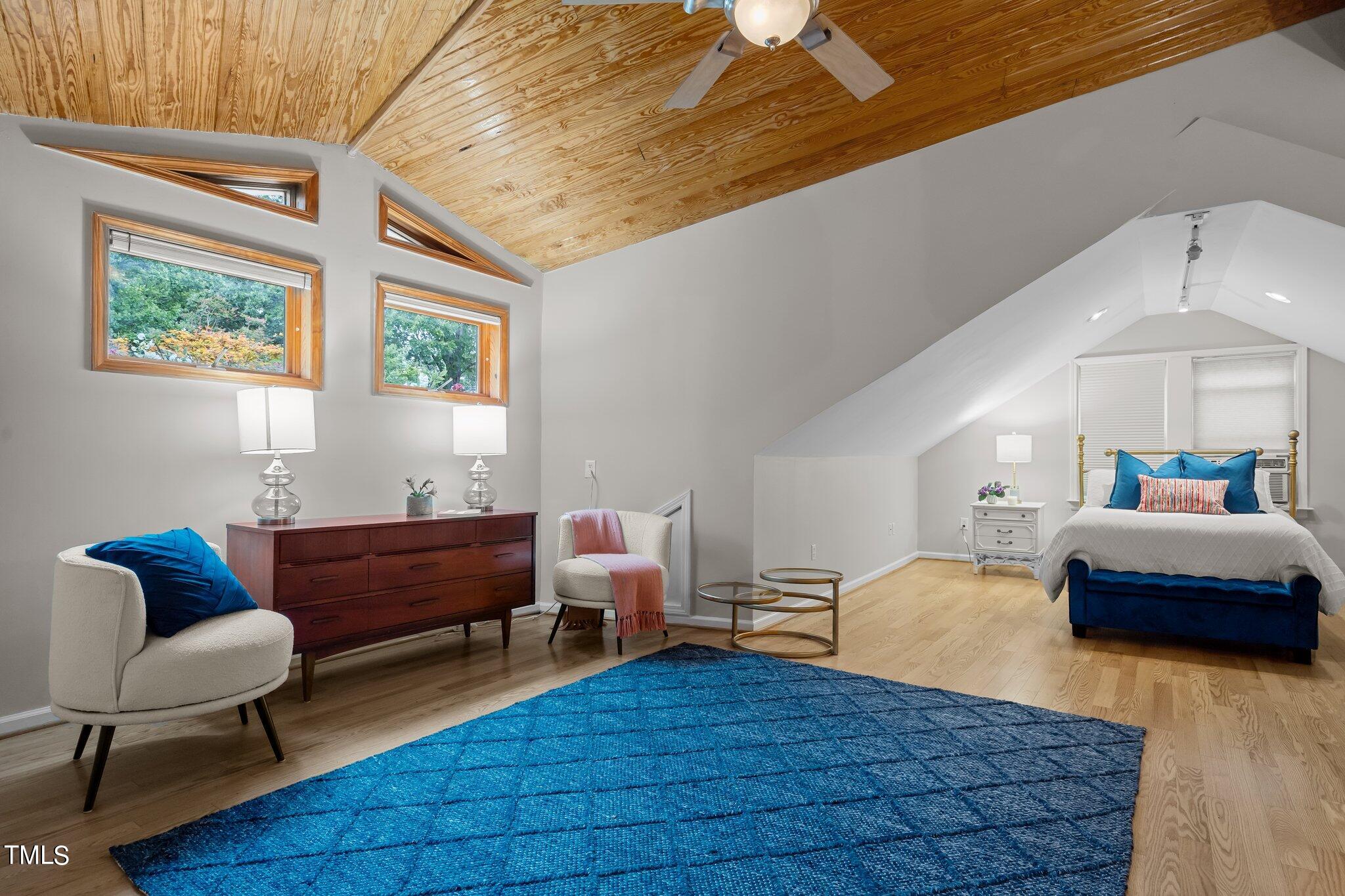 3215 Merriman Avenue Raleigh, NC 27607 - Photo 29 of 66 a bedroom with furniture and a window