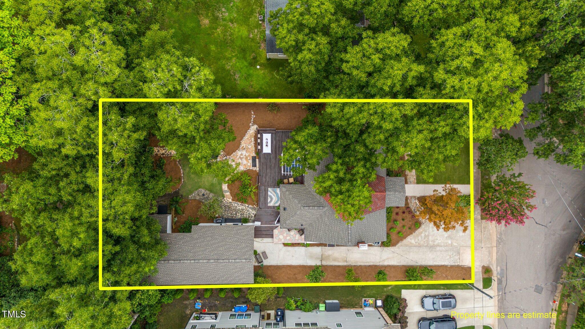 3215 Merriman Avenue Raleigh, NC 27607 - Photo 3 of 66 an aerial view of residential house with outdoor space and swimming pool