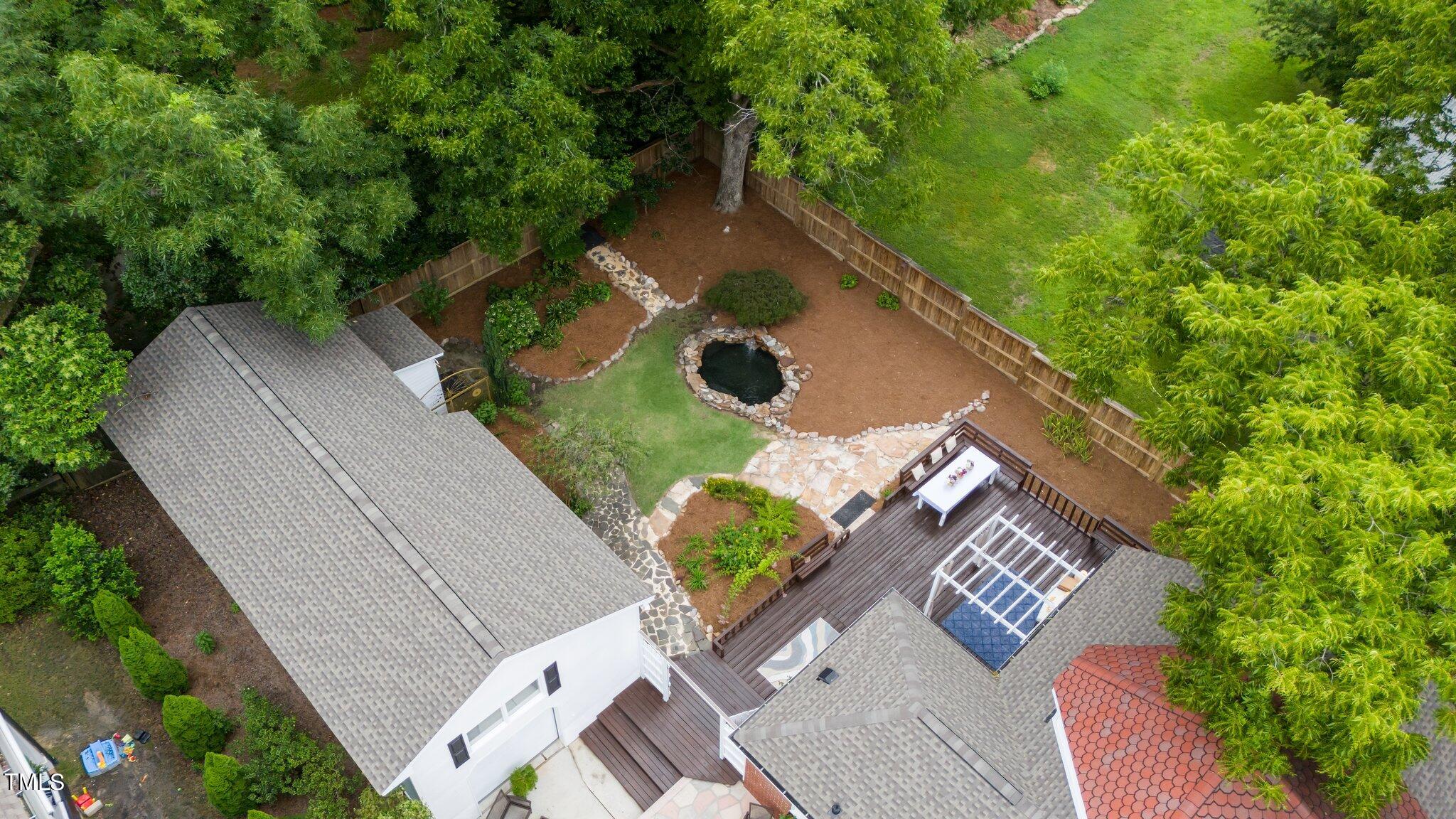 3215 Merriman Avenue Raleigh, NC 27607 - Photo 4 of 66 an aerial view of a house with a yard