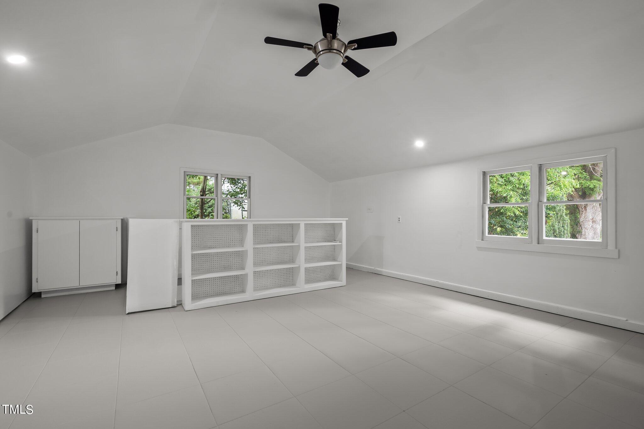 3215 Merriman Avenue Raleigh, NC 27607 - Photo 50 of 66 an empty room with a empty space and windows