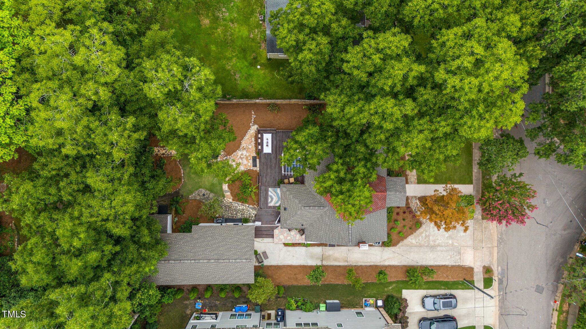 3215 Merriman Avenue Raleigh, NC 27607 - Photo 59 of 66 an aerial view of a house with a yard basket ball court