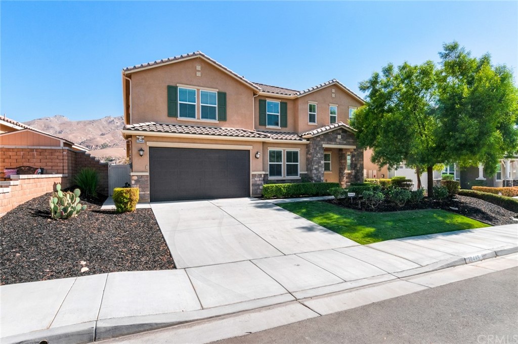 20445 Barrel Road Riverside, CA 92507 - Photo 1 of 1 a front view of a house with a garden and trees