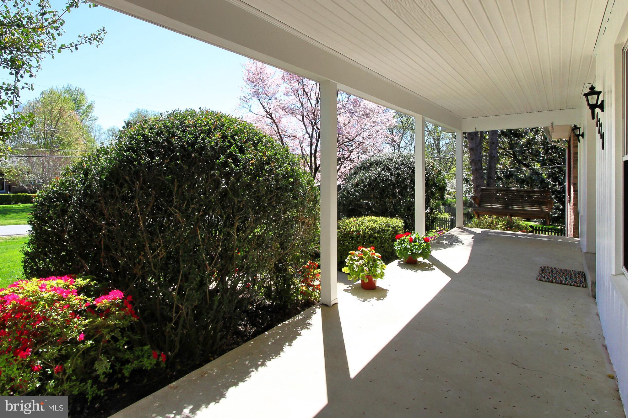 8228 Higham Road Lorton, VA 22079 - Photo 5 of 30 Covered Front Porch Overlooking Manicured Gardens