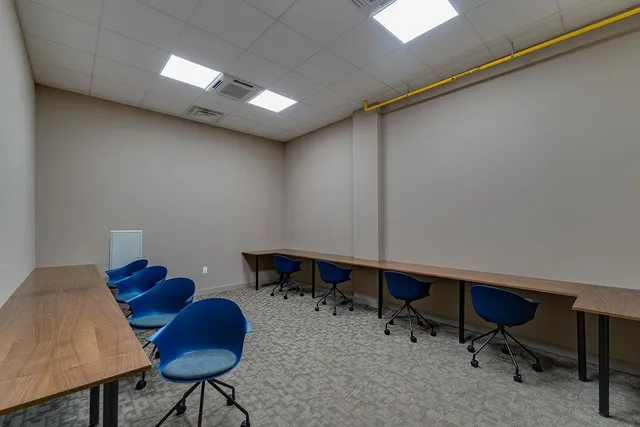 a workspace with furniture and a couch