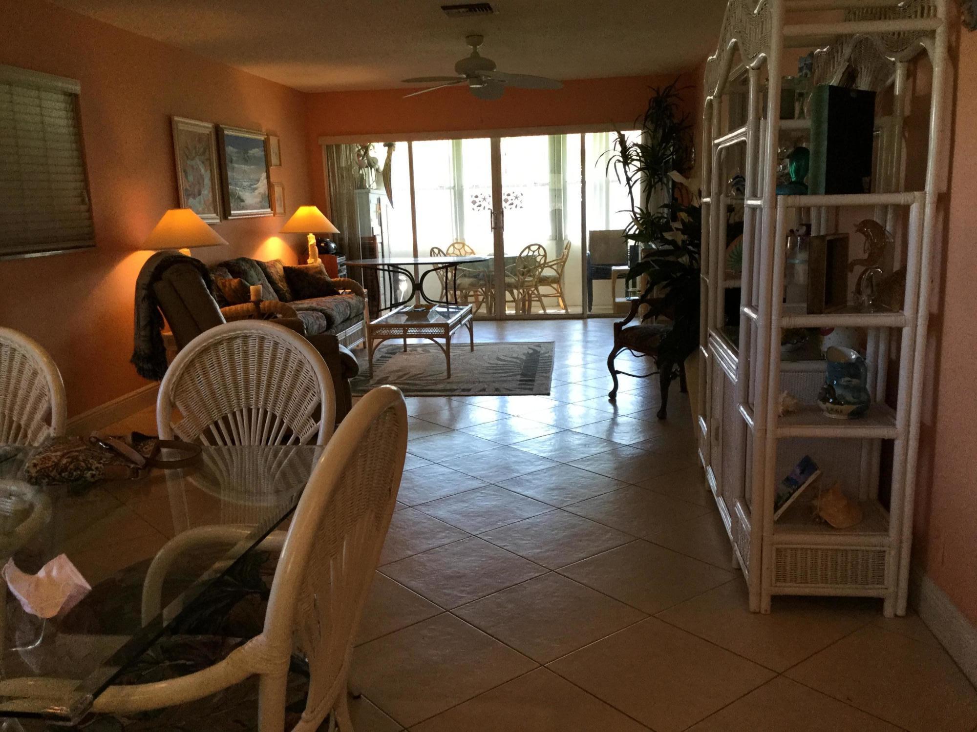 606 Hummingbird Lane Delray Beach, FL 33445 - Photo 17 of 43 LIVING ROOM DINING ROOM
