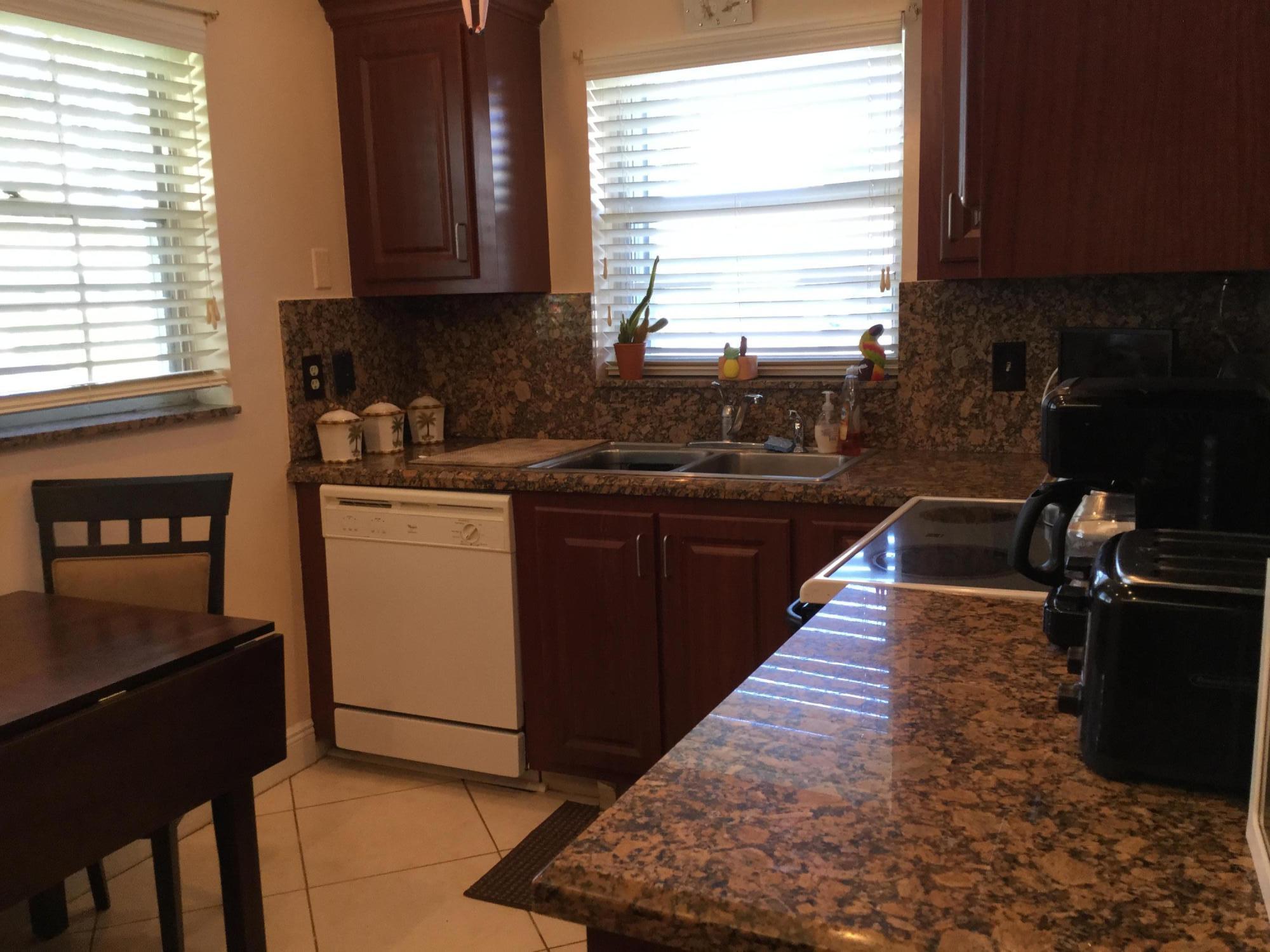 606 Hummingbird Lane Delray Beach, FL 33445 - Photo 6 of 43 EAT IN KITCHEN