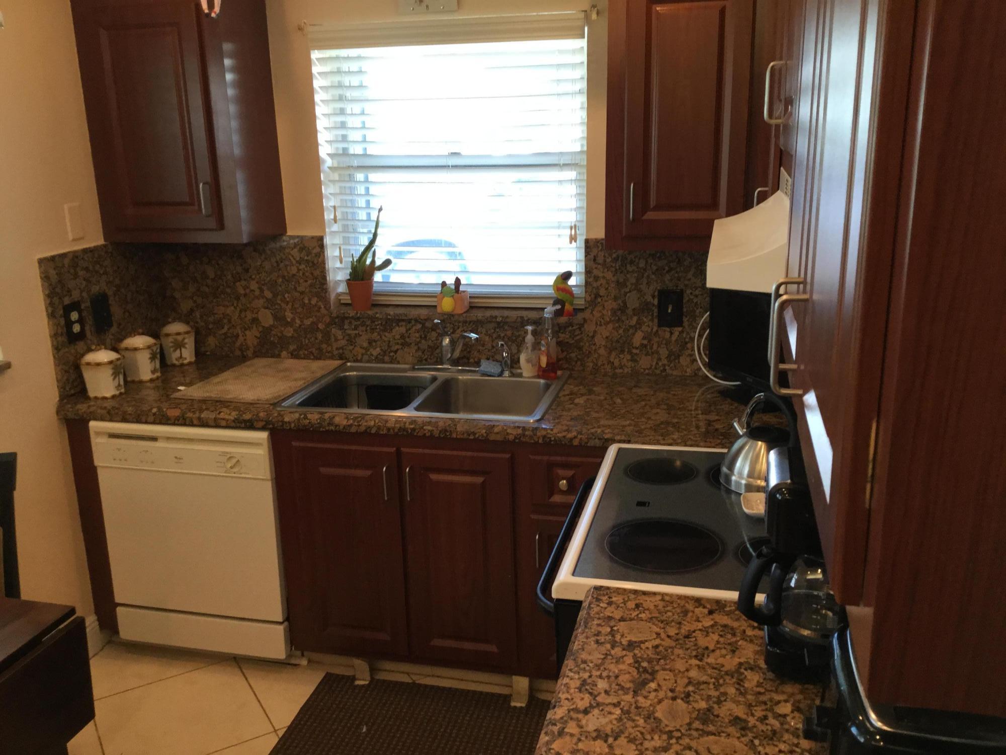 606 Hummingbird Lane Delray Beach, FL 33445 - Photo 9 of 43 KITCHEN