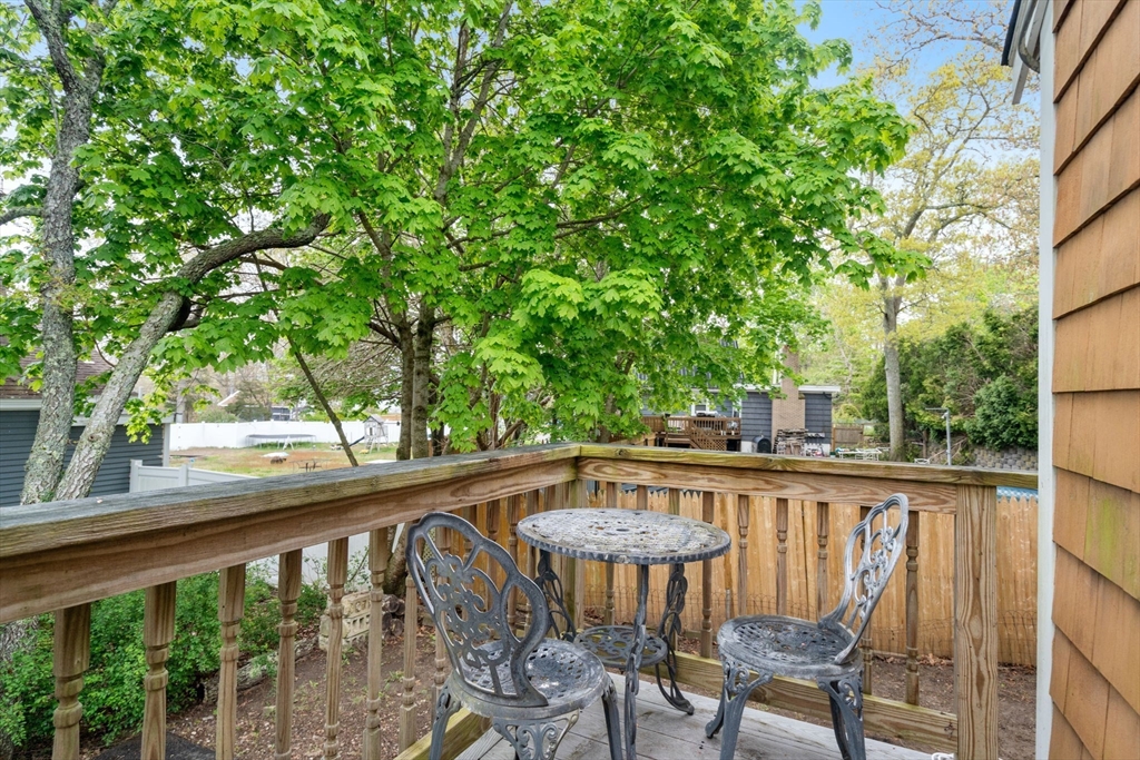 7 Indian Neck Road Wareham, MA 02571 - Photo 31 of 34 a view of a chair and table in the patio