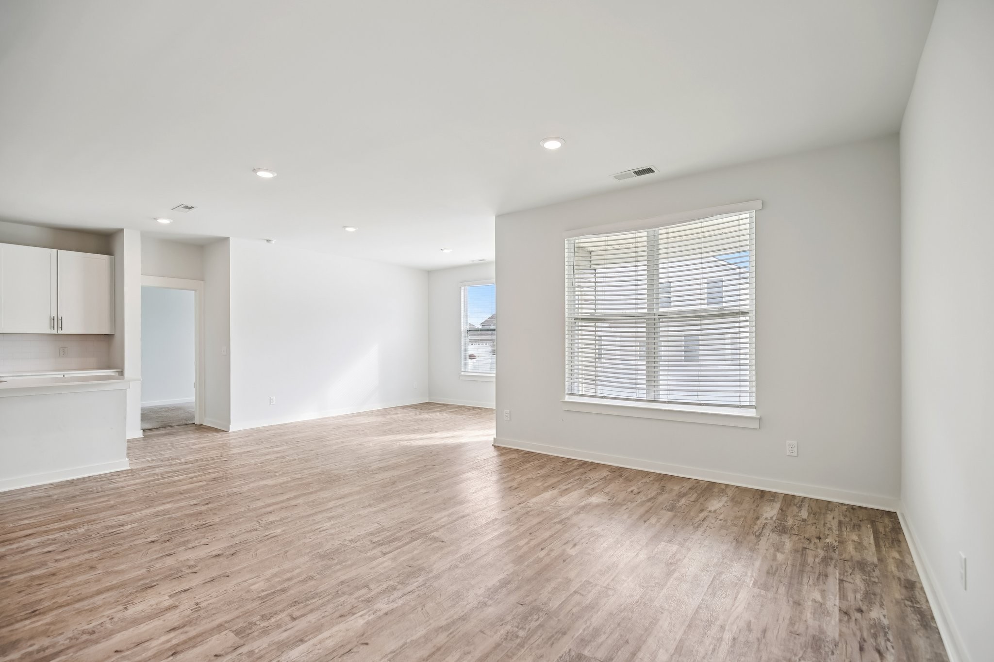 403 Wind Dance Drive Lebanon, TN 37087 - Photo 32 of 66 a view of an empty room with wooden floor and a window
