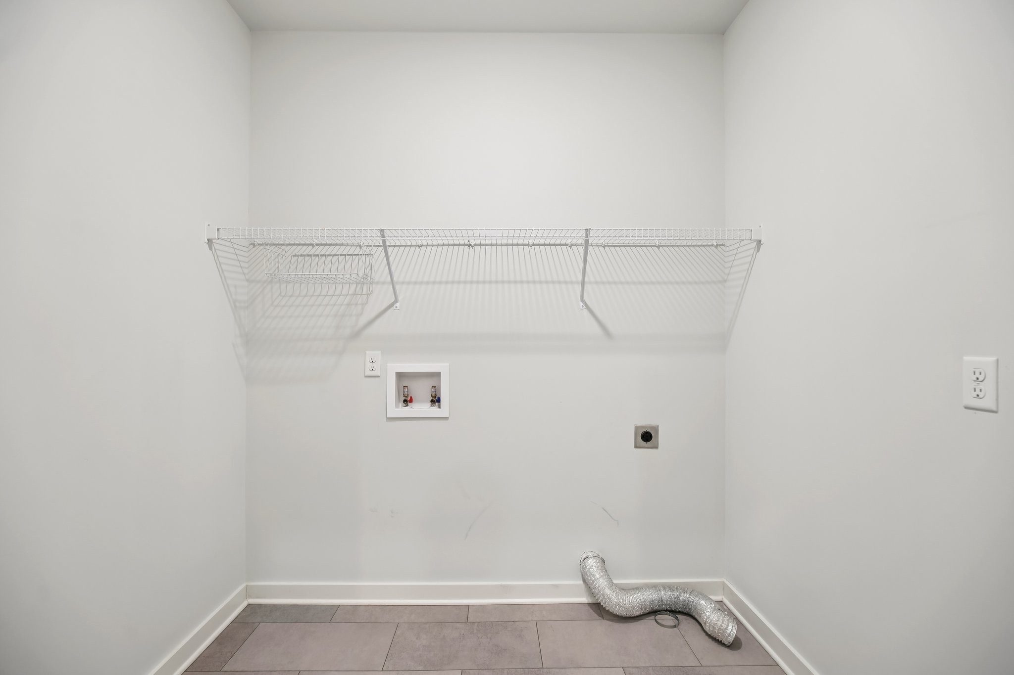 403 Wind Dance Drive Lebanon, TN 37087 - Photo 35 of 66 a view of a room with racks on the wall