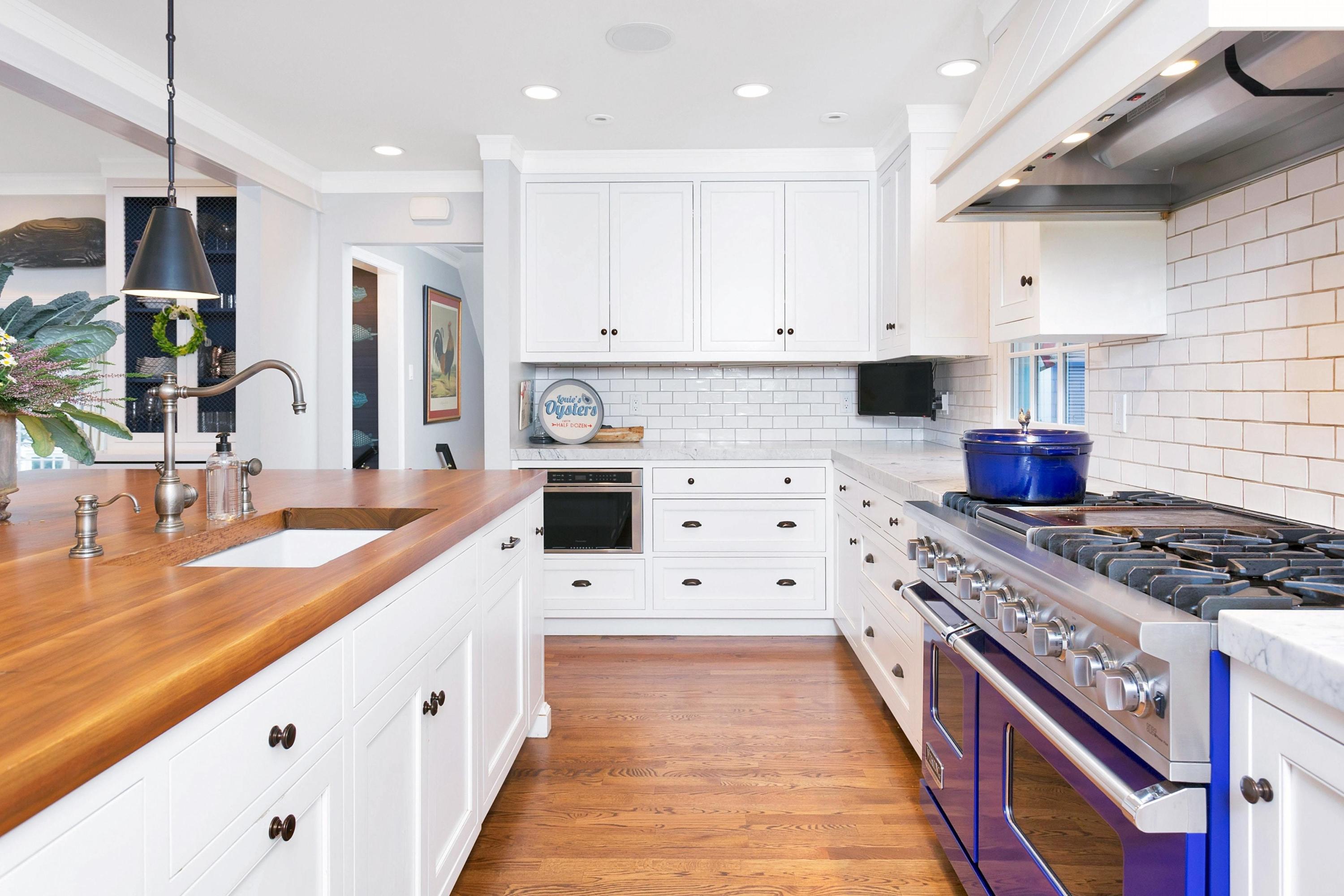 44 Deepwood Road Darien, CT 06820 - Photo 12 of 45 a kitchen with stainless steel appliances granite countertop a stove and a sink
