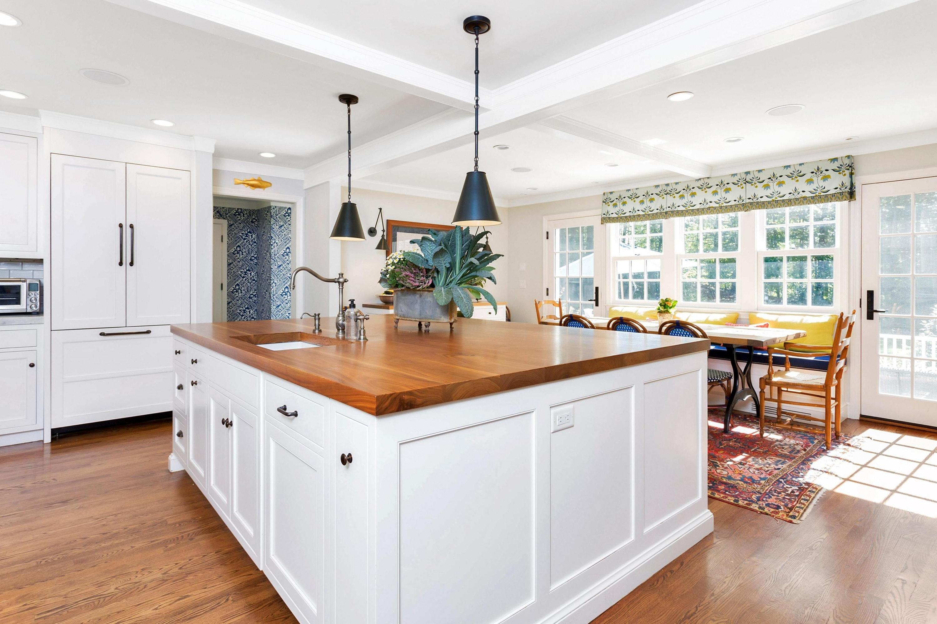44 Deepwood Road Darien, CT 06820 - Photo 13 of 45 a kitchen with counter top space and dining table