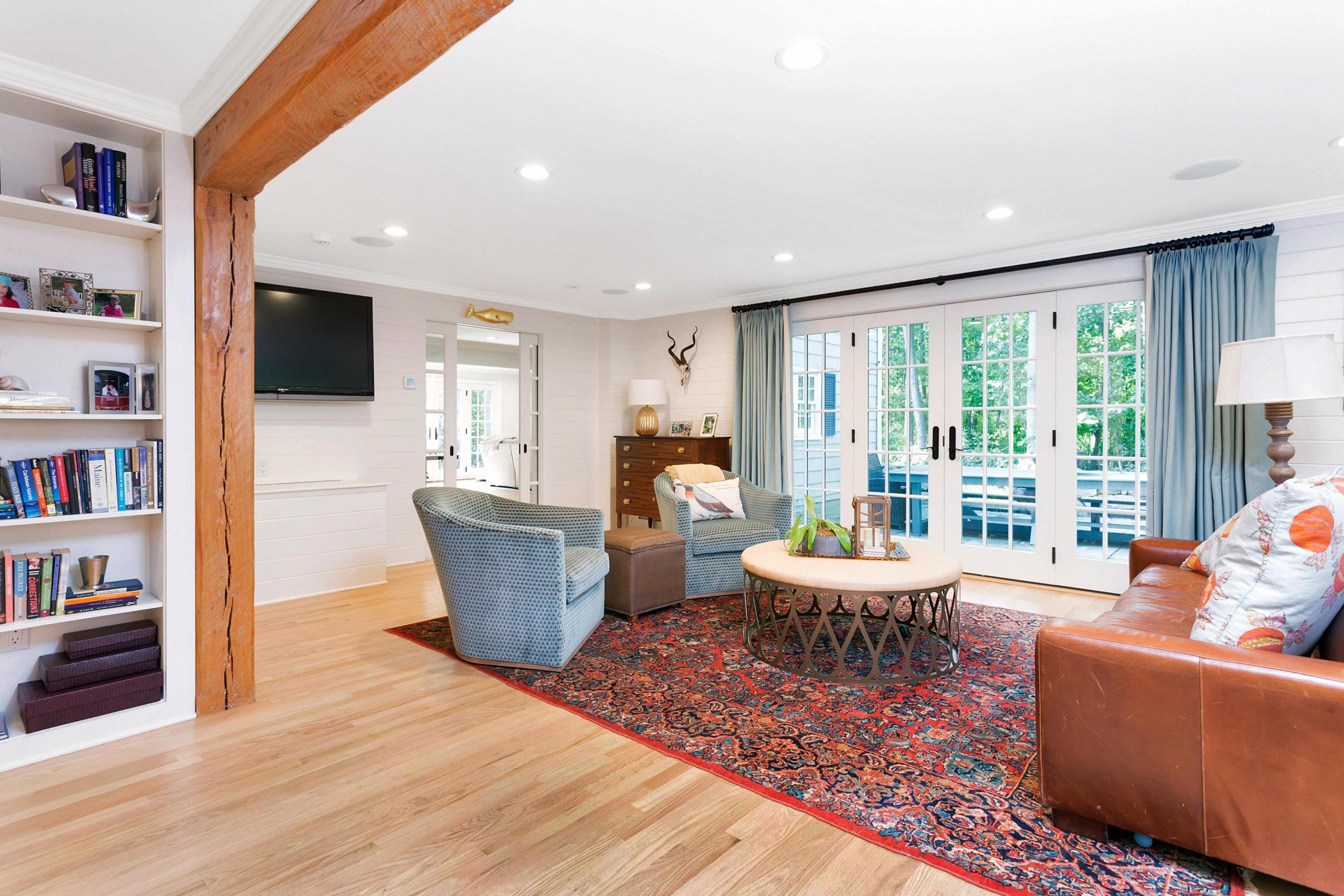 44 Deepwood Road Darien, CT 06820 - Photo 16 of 45 a living room with furniture and a flat screen tv