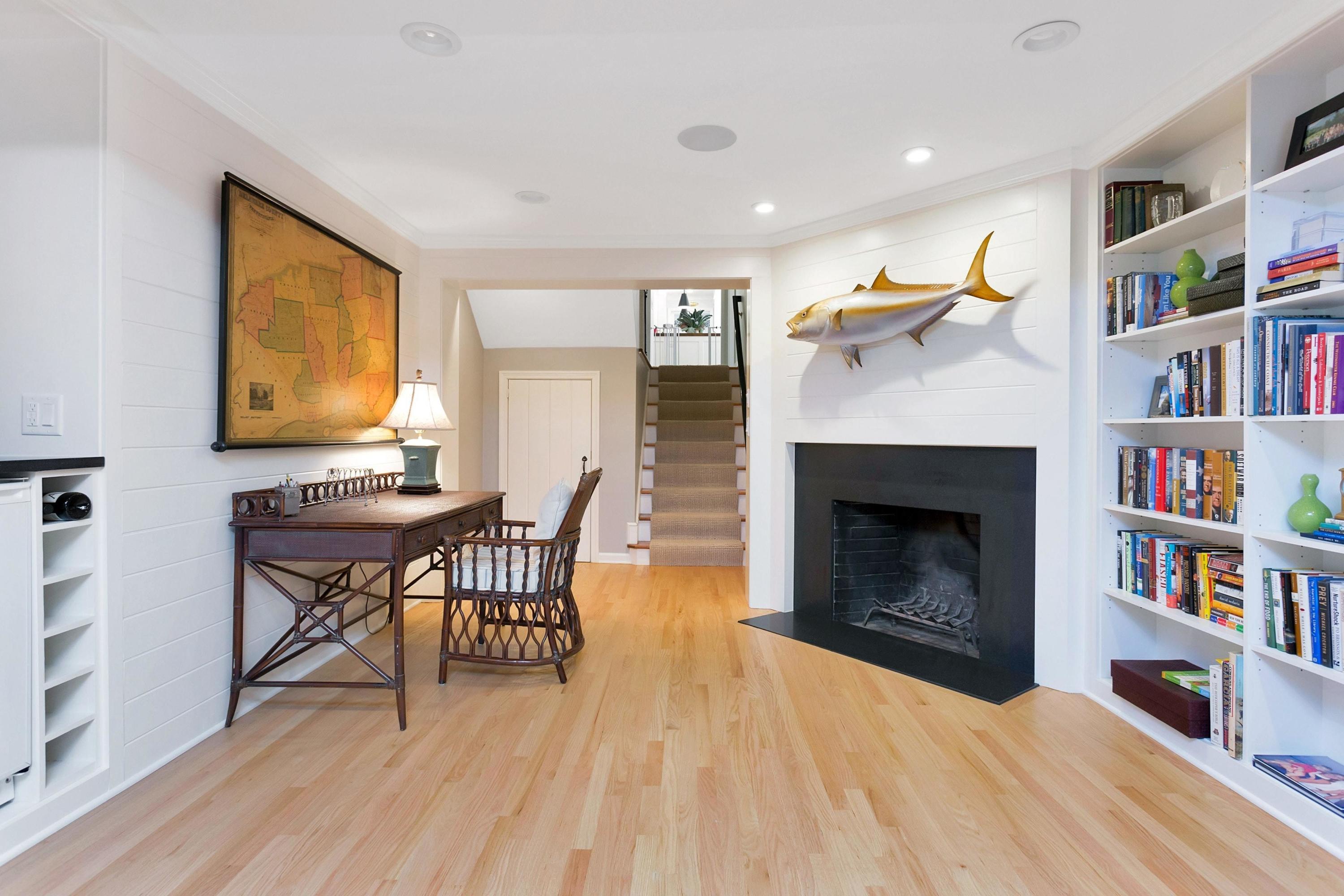 44 Deepwood Road Darien, CT 06820 - Photo 17 of 45 a living room with furniture and a fireplace
