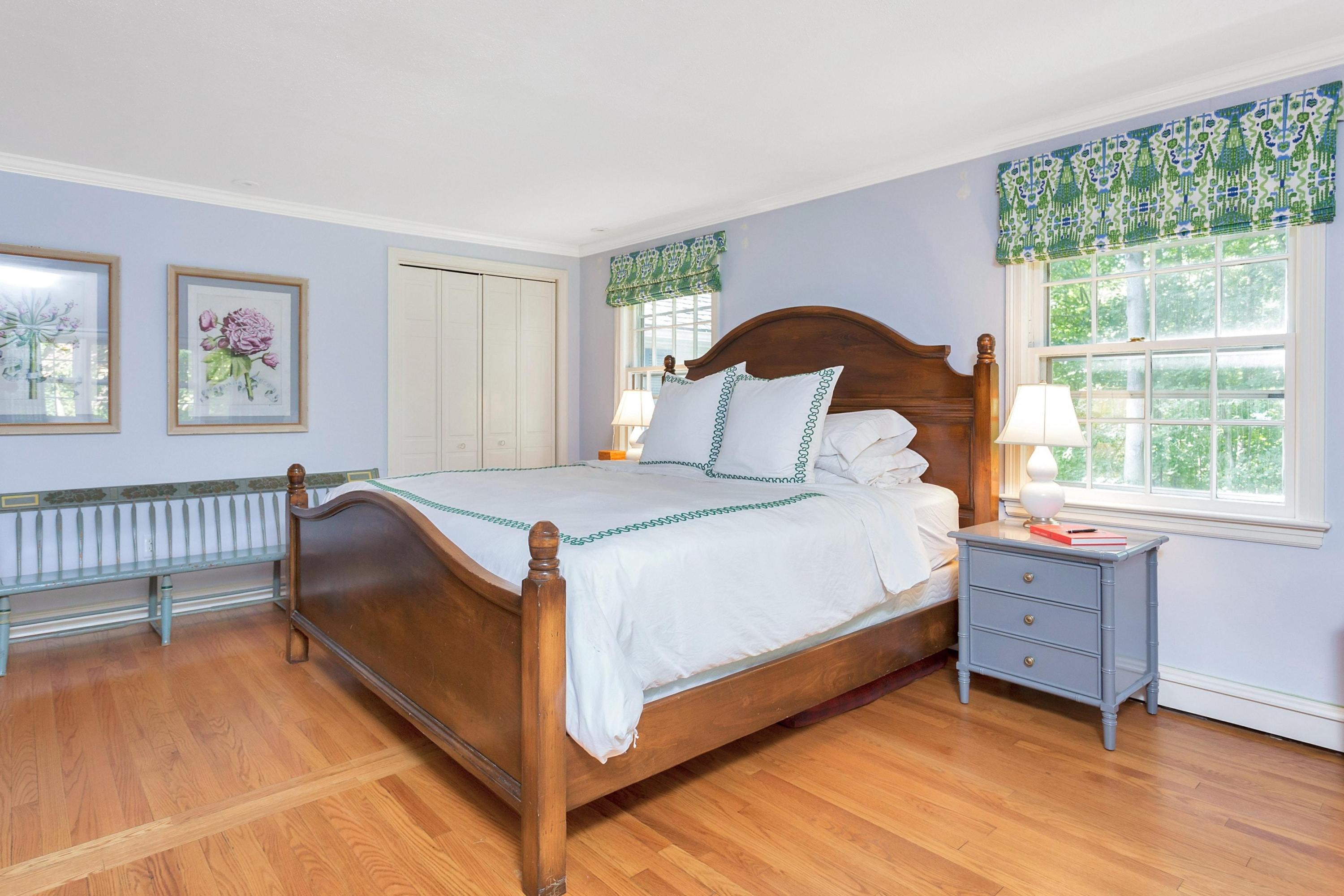 44 Deepwood Road Darien, CT 06820 - Photo 22 of 45 a bedroom with a bed and a window