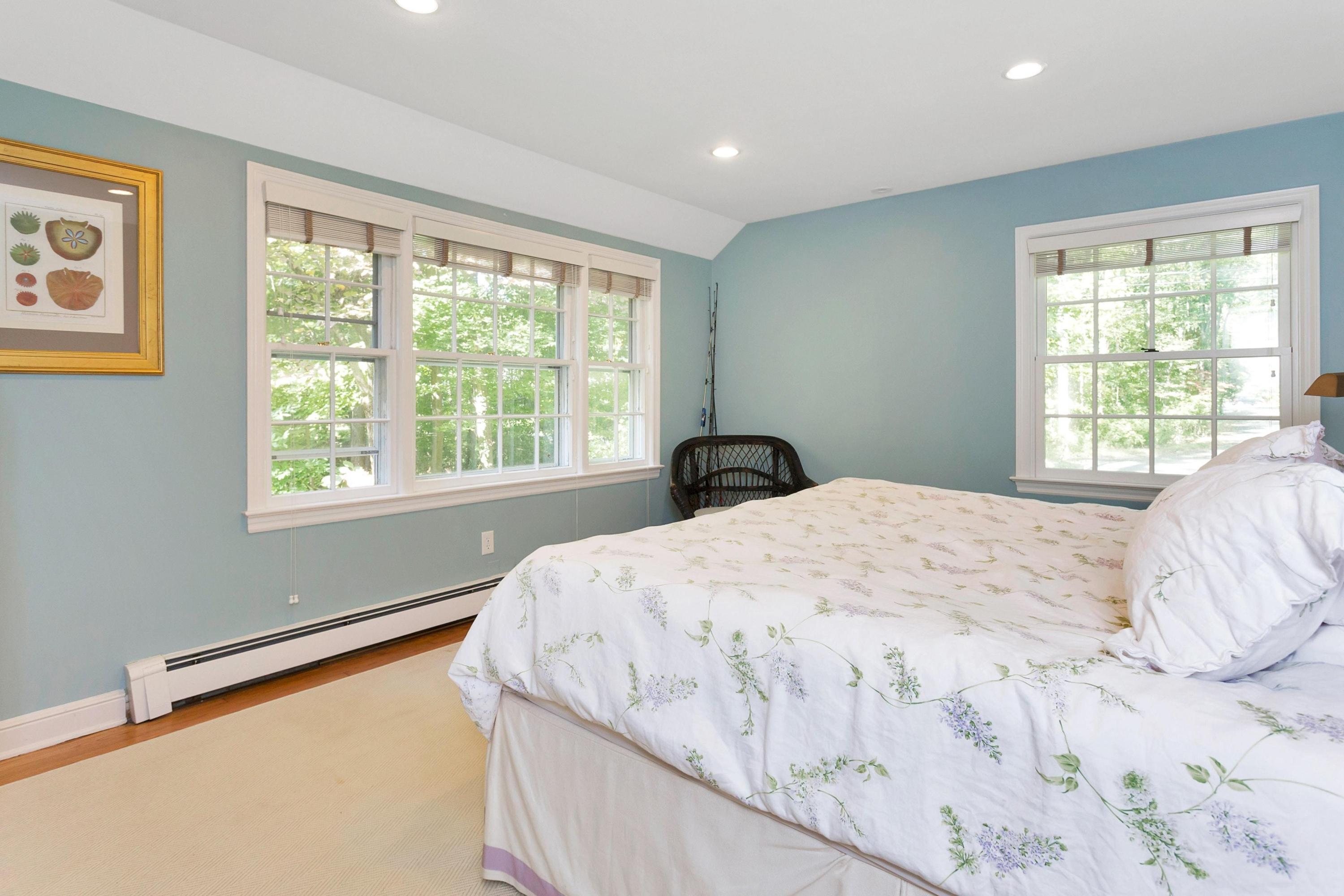 44 Deepwood Road Darien, CT 06820 - Photo 23 of 45 a bedroom with a bed and a window