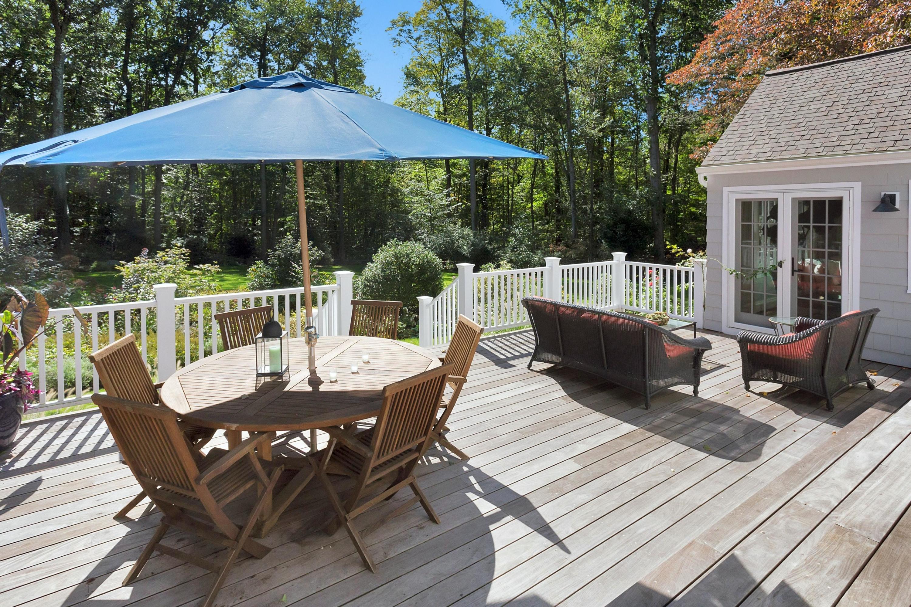 44 Deepwood Road Darien, CT 06820 - Photo 31 of 45 a view of deck with furniture and barbeque oven