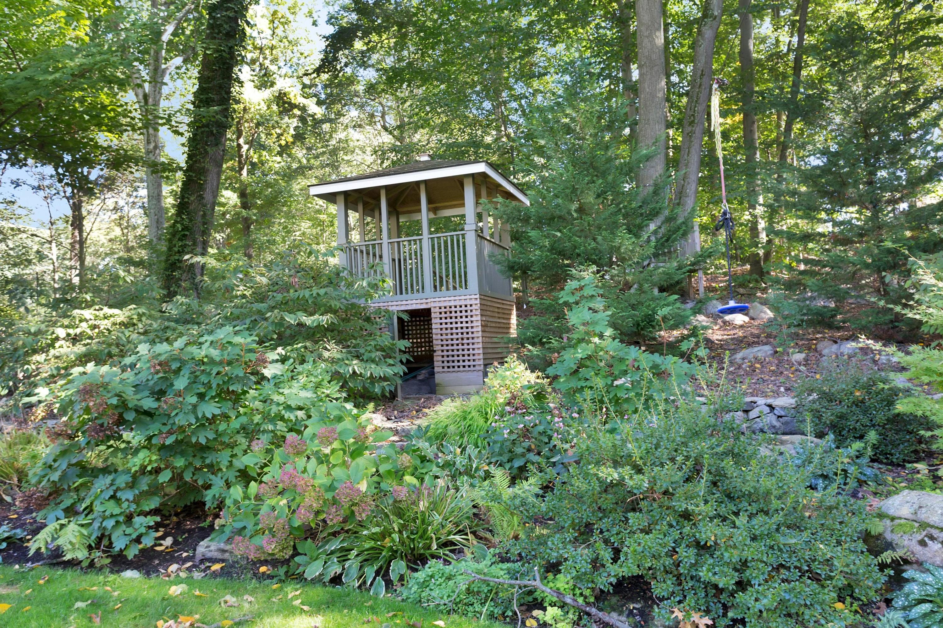 44 Deepwood Road Darien, CT 06820 - Photo 43 of 45 a view of house with yard and trees