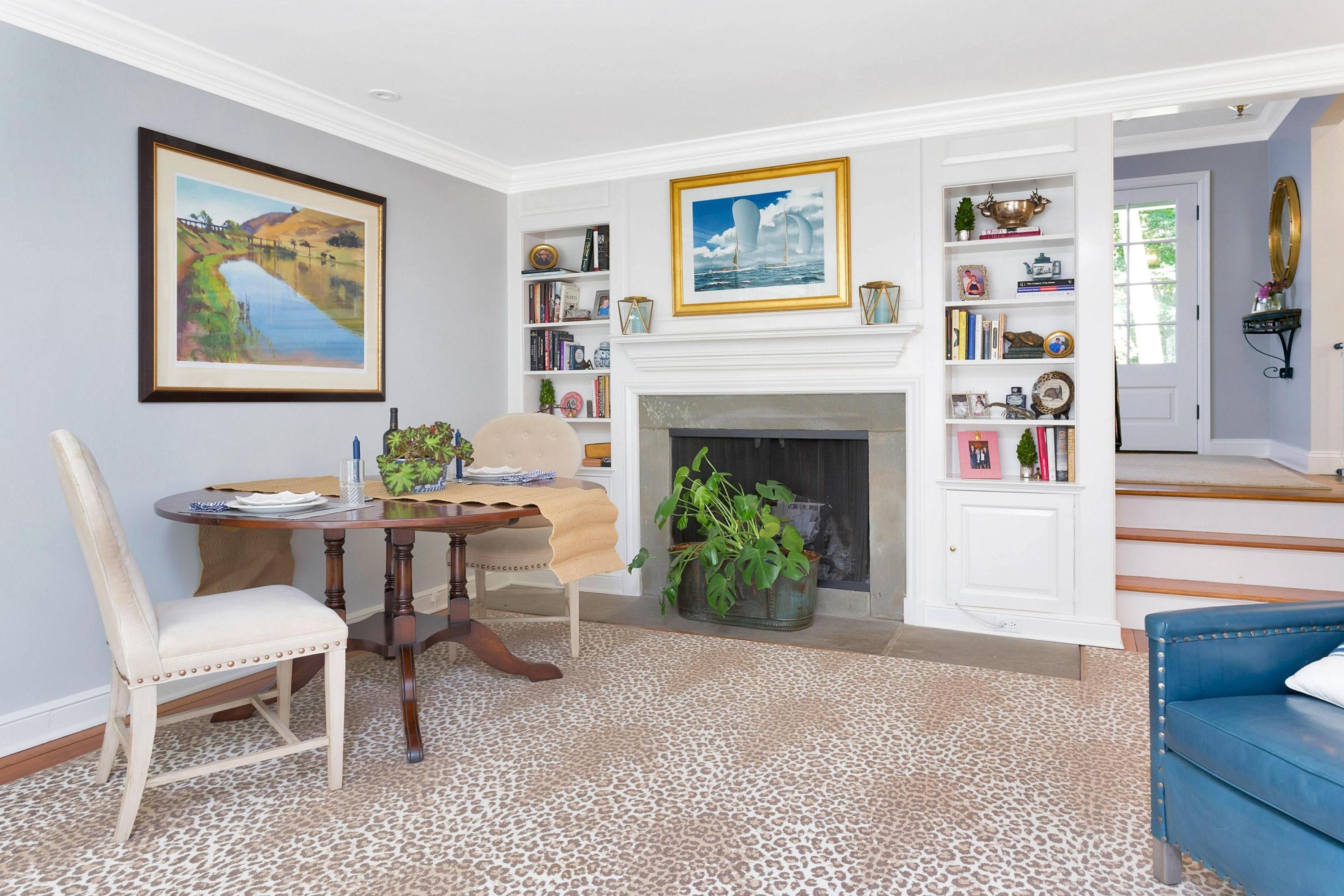 44 Deepwood Road Darien, CT 06820 - Photo 7 of 45 a living room with furniture and a fireplace
