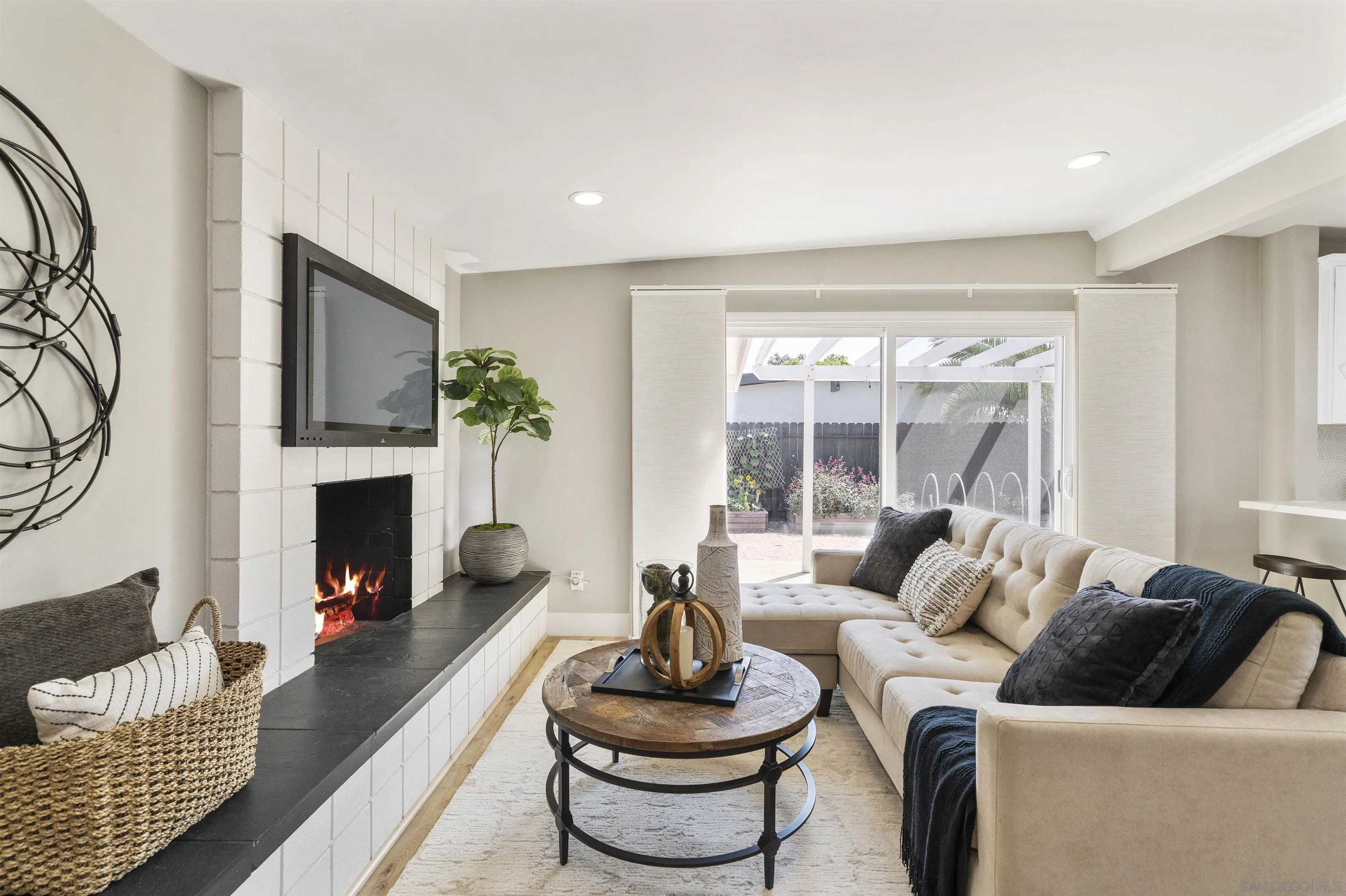 1007 Holly Avenue Imperial Beach, CA 91932 - Photo 5 of 39 a living room with furniture and a fireplace