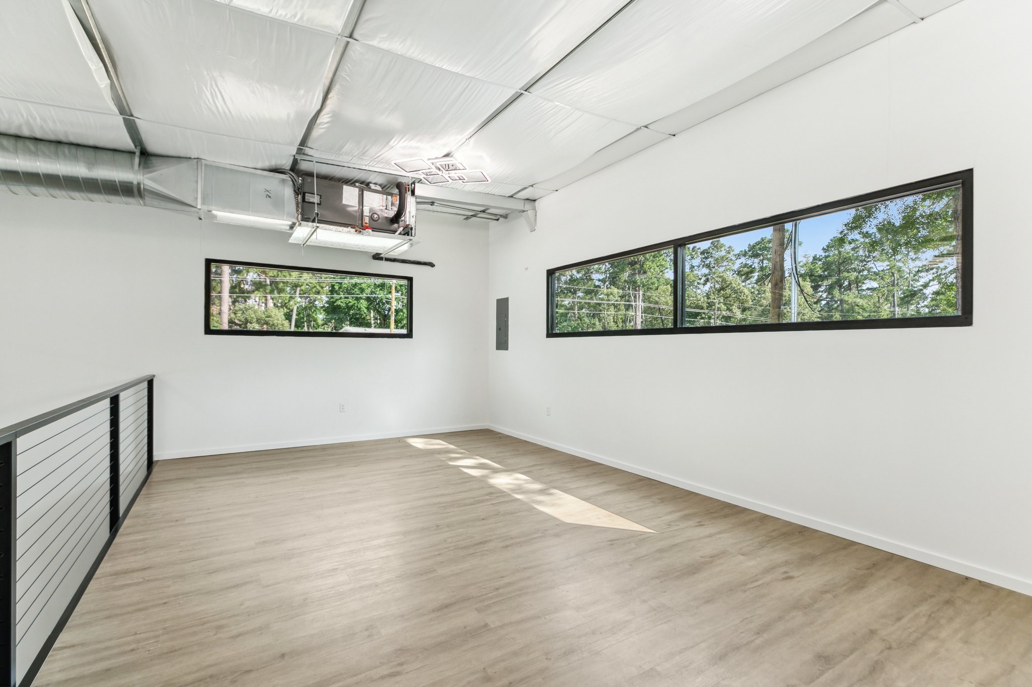 12402 Malcomson Road Houston, TX 77070 - Photo 11 of 50 an empty room with windows