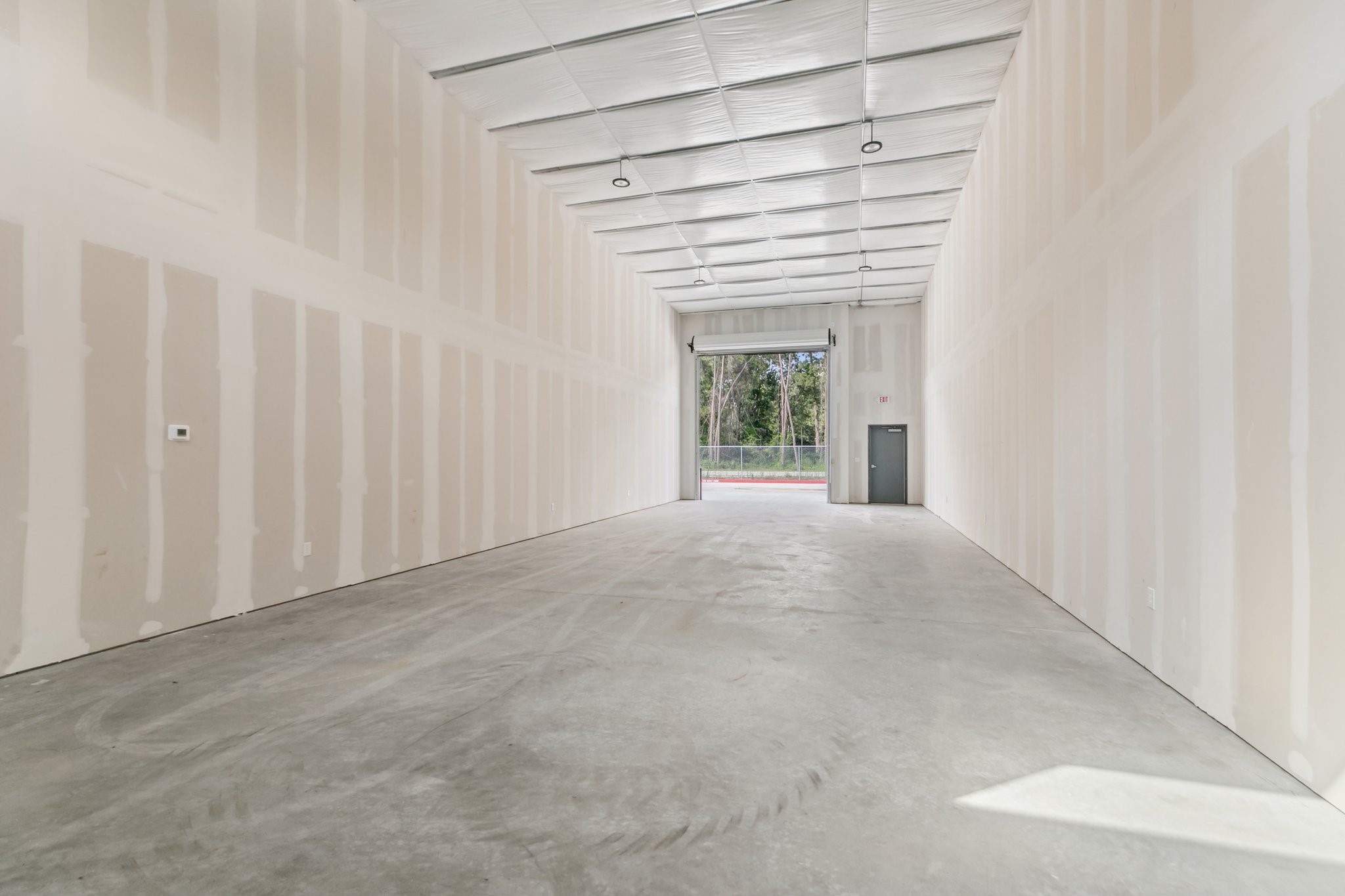 12402 Malcomson Road Houston, TX 77070 - Photo 15 of 50 a view of an empty room with a window