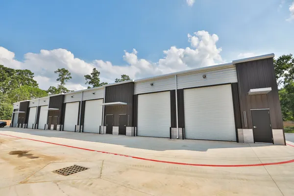 a view of a house with a snow in the yard