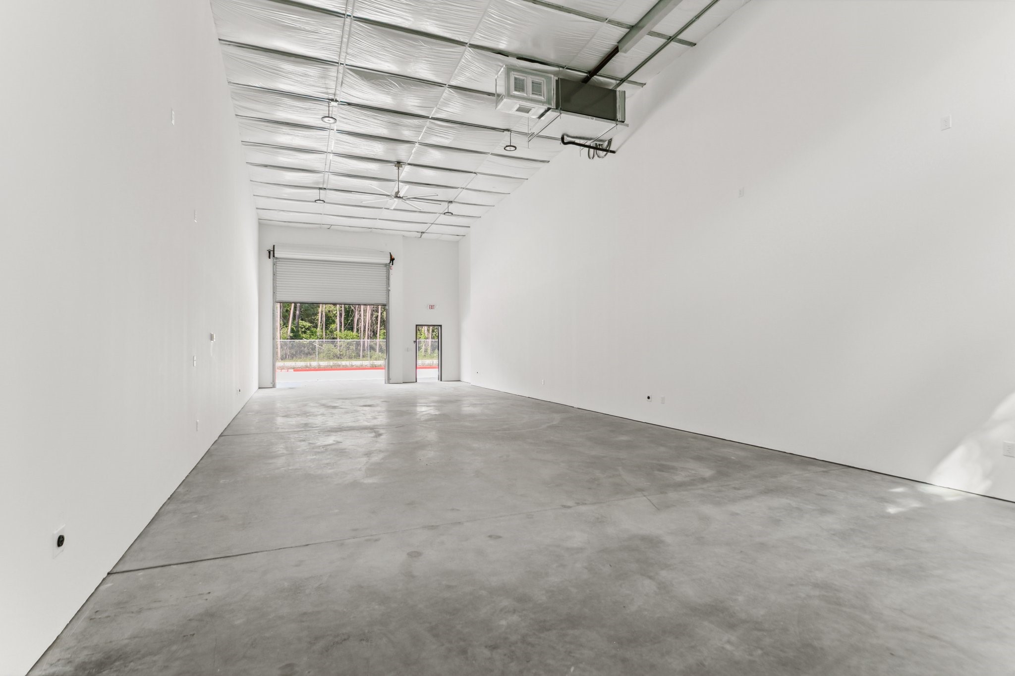 12402 Malcomson Road Houston, TX 77070 - Photo 22 of 50 a view of an empty room with a window
