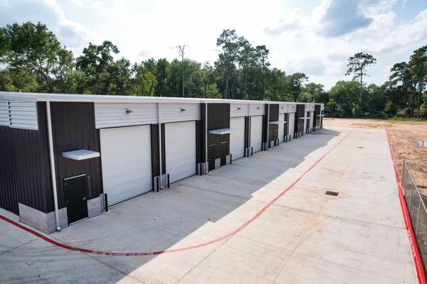 a view of a terrace with a table and chairs