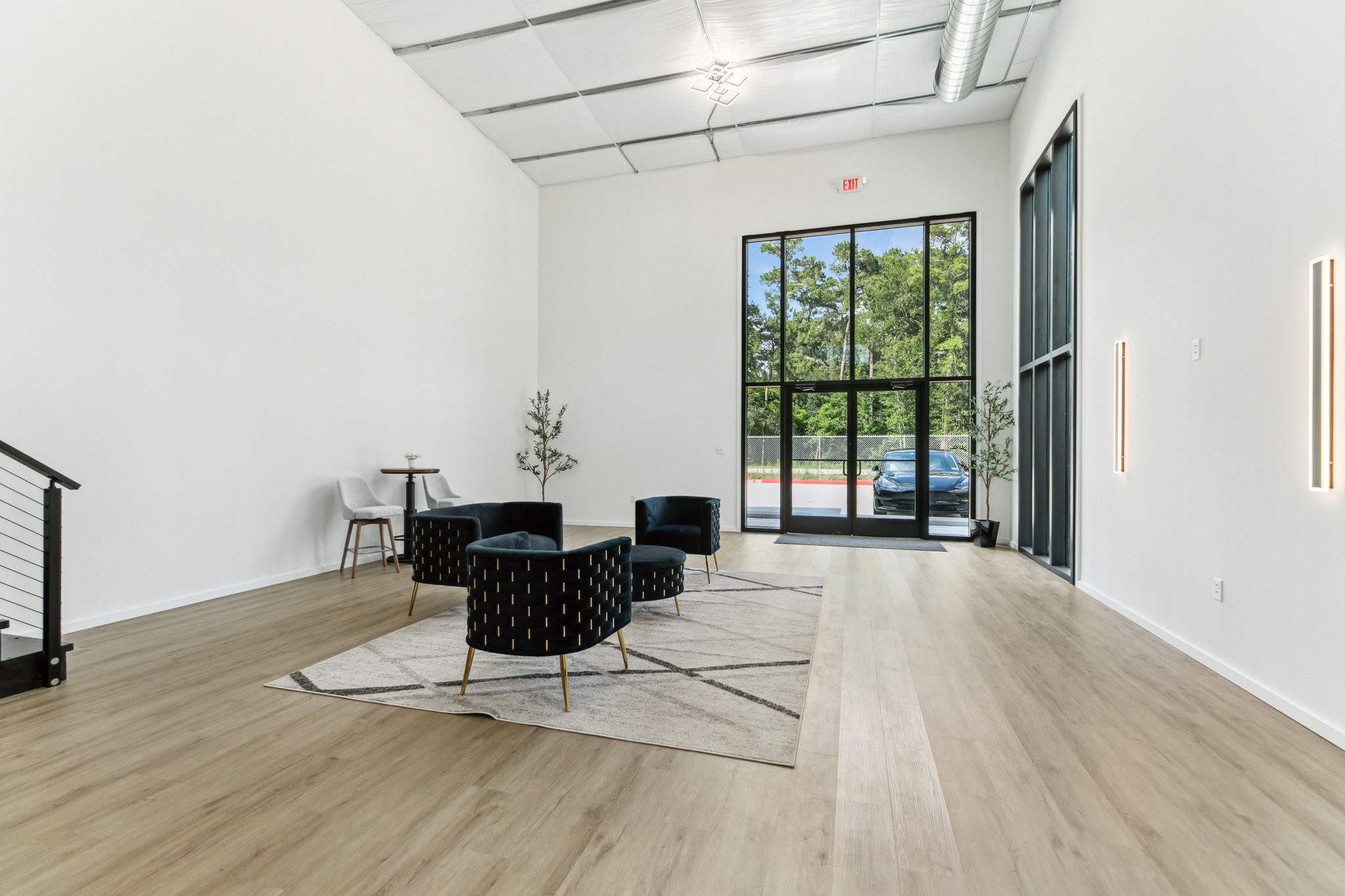 12402 Malcomson Road Houston, TX 77070 - Photo 5 of 50 a living room with furniture large window and wooden floor