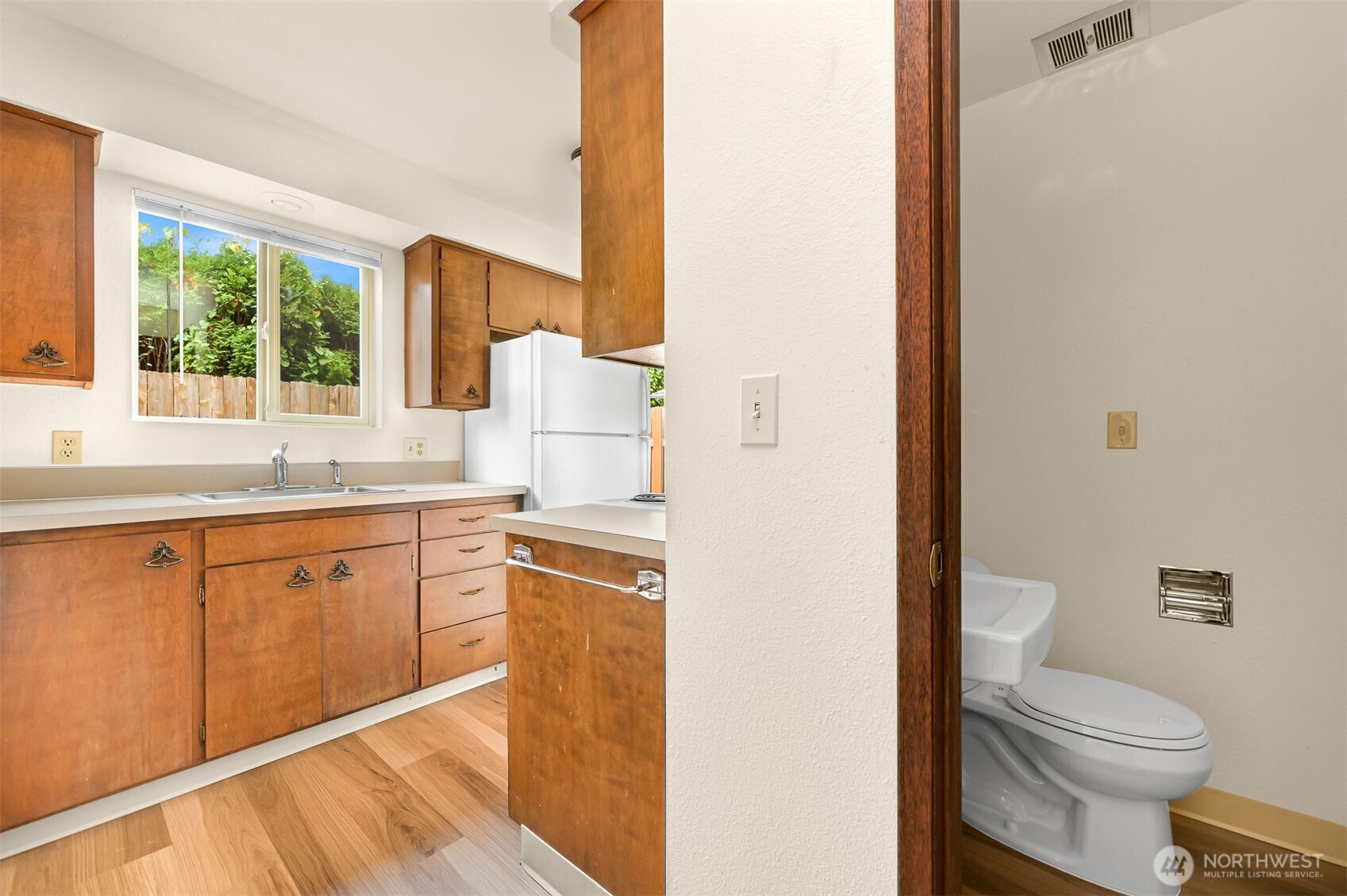 3330 Northwest Avenue Bellingham, WA 98225 - Photo 10 of 24 a spacious bathroom with a granite countertop sink toilet and large mirror