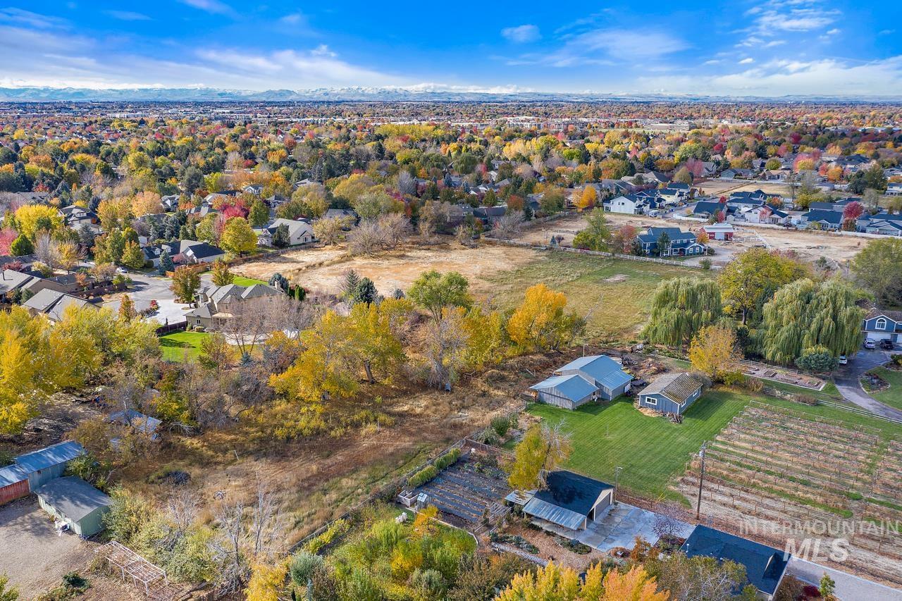 Tbd Lot 3 Tbd Boise, ID 83713 - Photo 3 of 6 Expansive aerial view showcasing a diverse landscape with residential areas, open fields, and mature trees