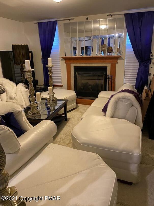 237 Coach Road Tobyhanna, PA 18466 - Photo 3 of 9 a living room with furniture and a fireplace