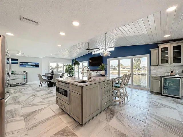 a living room with fireplace furniture and a flat screen tv