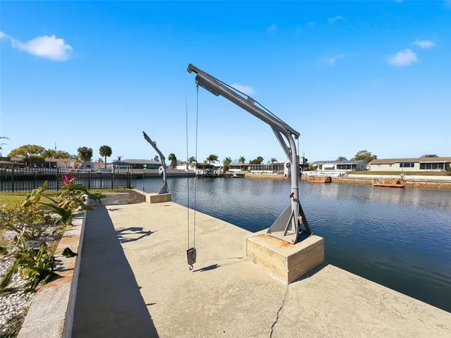 an aerial view of a house with outdoor space