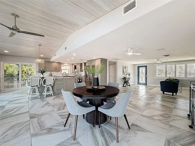 a kitchen with granite countertop counter space a sink appliances and cabinets