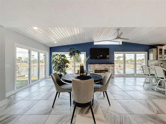 a kitchen with stainless steel appliances granite countertop a sink and cabinets