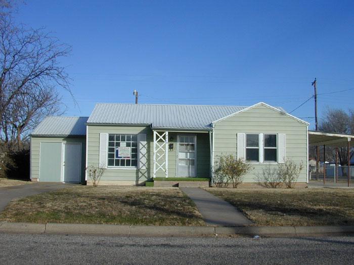 4119 South Lipscomb Street Amarillo, TX 79110 - Photo 1 of 1 a front view of a house with a yard