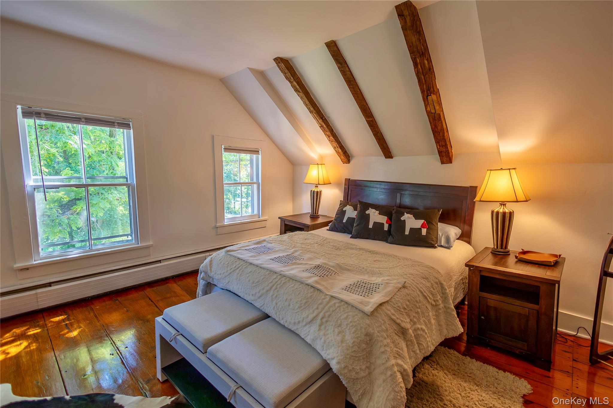 729 Cold Spring Road Stanfordville, NY 12581 - Photo 35 of 47 a bedroom with a bed and wooden floor