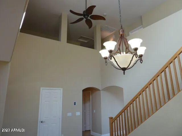 en view interior of a house with stairs and dining room view