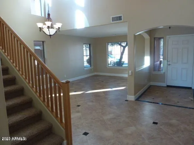 a view of a hallway with windows