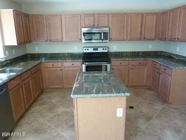 a close view of sink and microwave