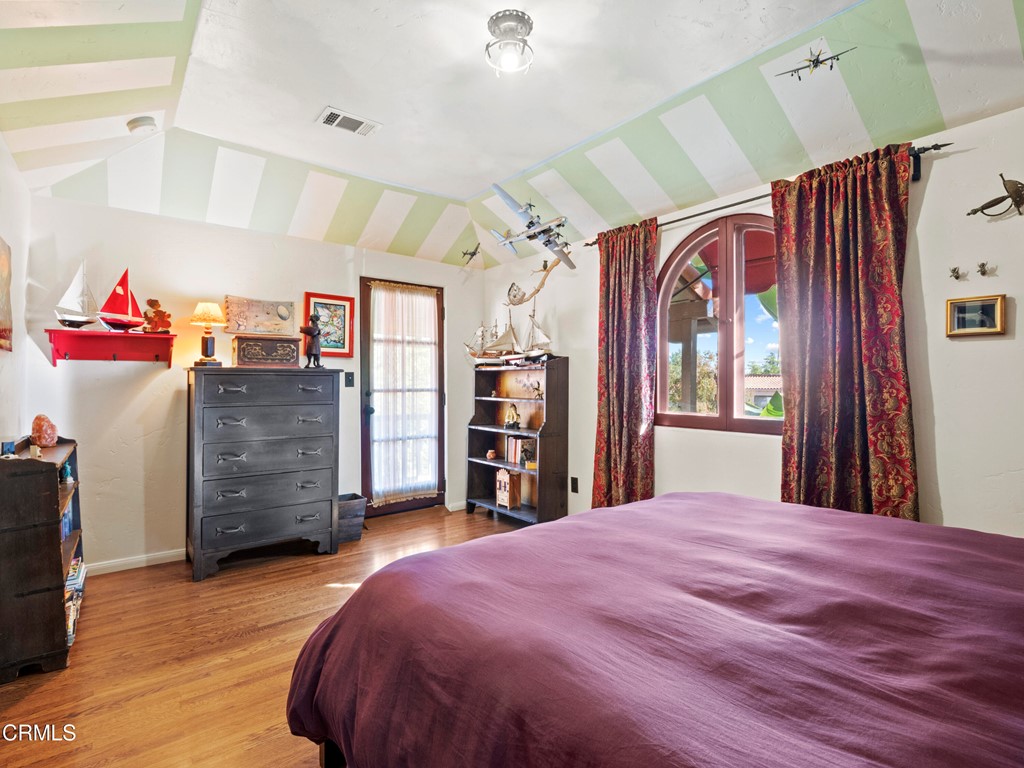 1505 Carroll Drive Altadena, CA 91001 - Photo 30 of 40 a bed room with a bed and a walk in closet