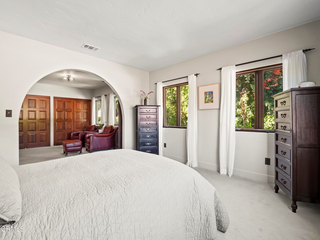 1505 Carroll Drive Altadena, CA 91001 - Photo 37 of 40 a large bedroom with bed and glass windows