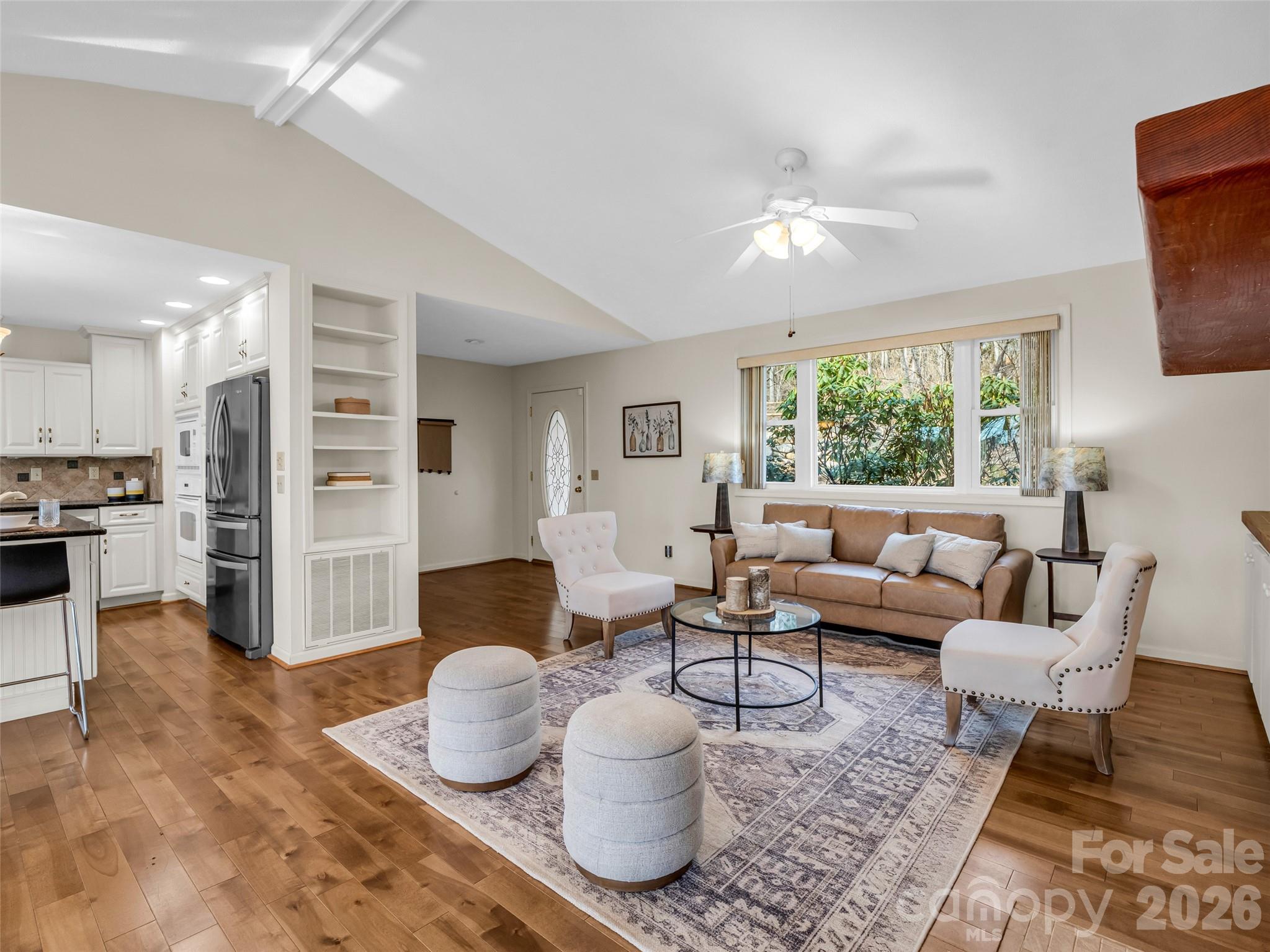 1594 Indian Cave Road Hendersonville, NC 28739 - Photo 11 of 48 a living room with furniture and a large window