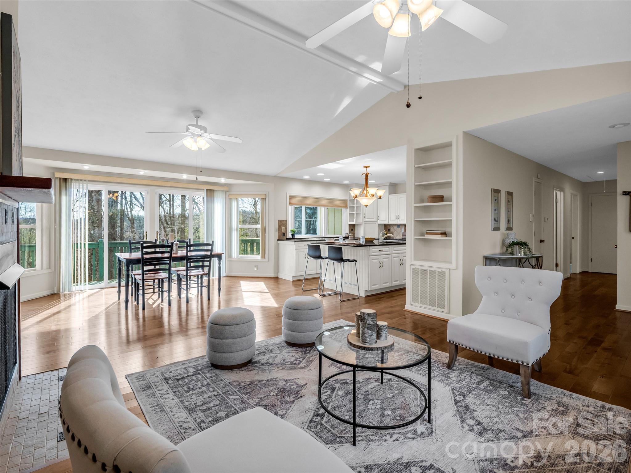 1594 Indian Cave Road Hendersonville, NC 28739 - Photo 12 of 48 a living room with furniture and a table