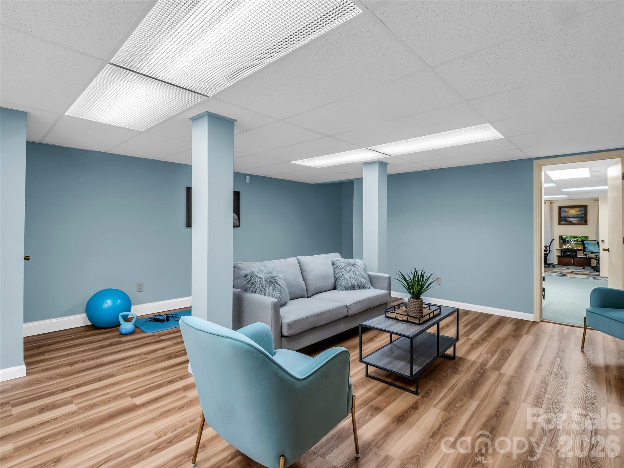 1594 Indian Cave Road Hendersonville, NC 28739 - Photo 34 of 48 a living room with furniture and wooden floor