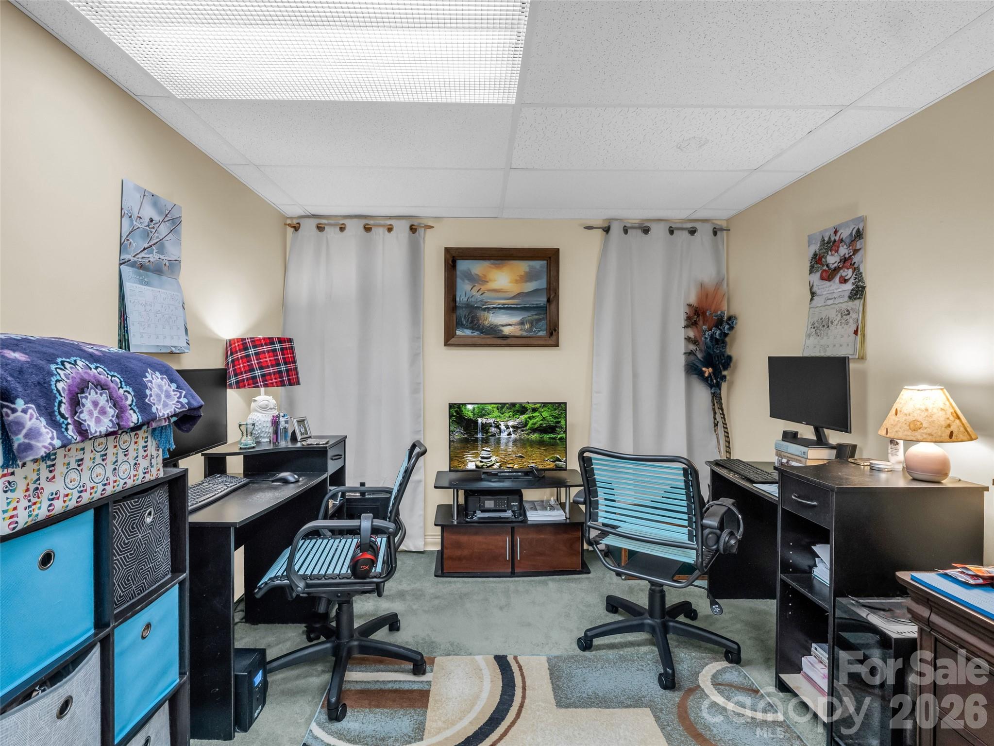 1594 Indian Cave Road Hendersonville, NC 28739 - Photo 36 of 48 a livingroom with workspace workspace and a window