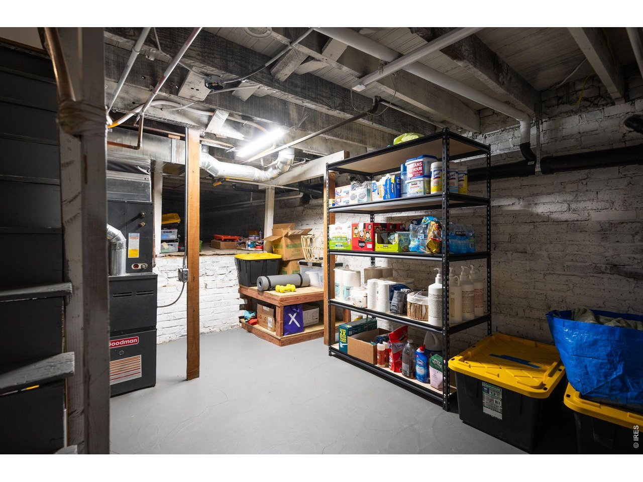 1070 Cook Street Denver, CO 80206 - Photo 21 of 35 a utility room with lots of wooden furniture